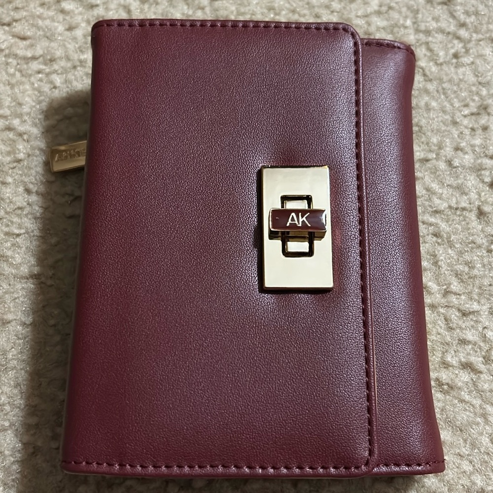Anne Klein Women’s Flap Wallet With Enamel Turn Lock.